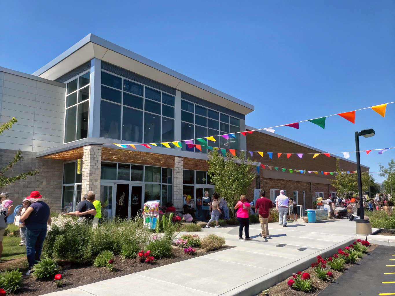 A thriving community center with local families gathered outside